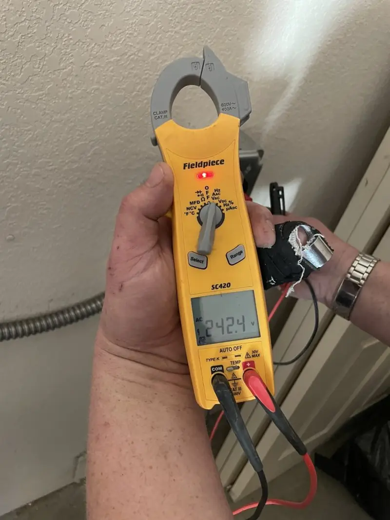 Voltage testing with clamp meter during Aluminum Wiring Replacement in Rockford